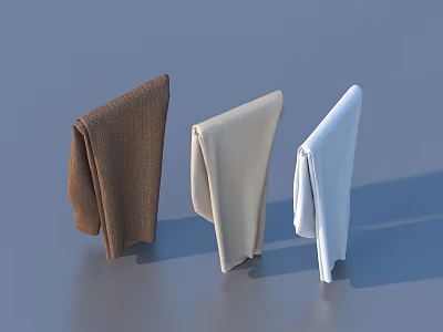Three Brown Beige And White Folded Clothes In Soft Knitted Material On Gray Surface 3d model