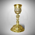 Luxurious Vintage Golden Goblet With Intricate Carved Patterns And Elegant Tall Stem Design