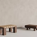 Two Different Designed Stools With Striped Pattern And Solid Color On Light Floor