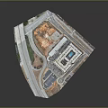 Aerial View of Modern Apartment Building with Parking Lot and Surrounding Roads Near Open Land