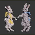 White Bunny Stuffed Toys With Yellow And Blue Bows Standing On Dark Surface
