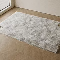 Soft Plush Square Rug On Herringbone Wooden Floor In Bright Room