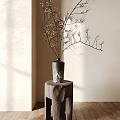 Vase With White Blossom Branches On Wooden Stump Light Colored Wall And Wooden Floor