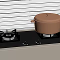 Black Gas Stove With Blue Flames And Orange Pot With Lid In Kitchen