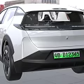 White Electric Car With Modern Design And Green License Plate