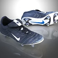 Nike Soccer Cleats in Navy Blue and White with Classic Design and Cleated Soles