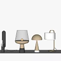 Multiple Modern Table Lamps With Different Shapes And Metallic Bases On White Background 3d model