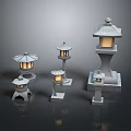 Traditional Japanese Stone Lanterns In Multiple Various Sizes With Illuminated Details