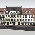European Style Commercial Street With Red Roofs Arched Doors And Balconies