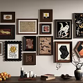 Stylish Photo Wall With Various Shaped Frames Artworks And Tabletop Oranges Candles Books Vase