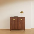 Walnut Decorative Cabinet With Golden Round Knobs And Books On Top Near Light Wall 3d model