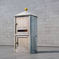 Wooden Commercial Mailbox Equipment with Pitched Roof and Yellow Spherical Top Against Gray Brick Wall