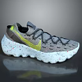 Nike Sports Shoes With Grey Knit Upper Yellow Accents And White Speckled Sole Crisscross Laces