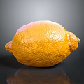 Fresh Yellow Lemon With Smooth Textured Skin On Dark Reflective Surface