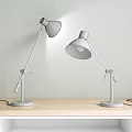 Navy Blue and White Table Lamps with Wooden Handles White Bases on Wooden Tabletop