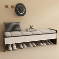 Entryway Bench With Checkered Cushion Stacked Books And Shoe Storage Drawers On Beige Wall