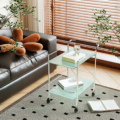 Modern Rolling Side Table with Glass Shelves and Wheels in Living Room with Plants 3d model