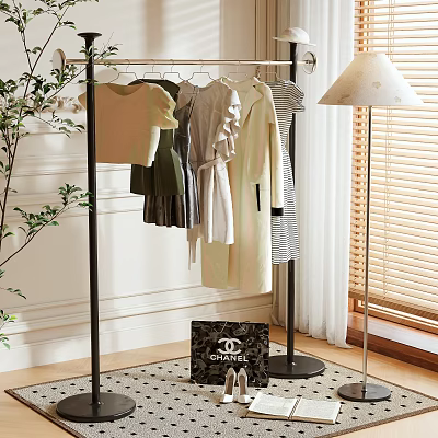 Clothing Rack with Hanging Clothes and a Chanel Bag Near Window with Blinds 3d model