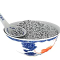 Gray Granular Food Filled In Blue And White Patterned Bowl With Chinese Traditional Spoon