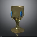 Elegant Golden Decorative Cup With Blue Accents And Intricate Patterned Base