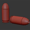 Two Shiny Brass Bullets With Copper Tips Lying On Reflective Dark Surface