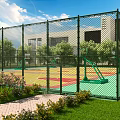 Outdoor Basketball Court With Green Fence Colorful Floor Trees And Grass Around
