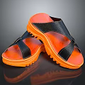 Comfortable Black And Orange Slippers With Cross Straps And Textured Sole