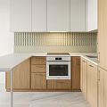 Light Oak Kitchen Cabinets With White Upper Units Vertical Striped Tile Backsplash And Oven Countertop