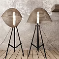 Modern Floor Lamps With Woven Curved Shades Black Tripod Stands Gray Textured Wall Wooden Floor