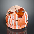 Broken Carved Ceramic Sculpture With Red White Stripes Holes And Spherical Shape