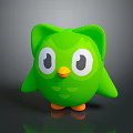 Green Cartoon Owl Toy With Big Eyes Orange Beak And Cute Design