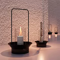 Decorative Ornament Combination Of Black Metal Candle Holders With Lit White Candles In Various Sizes