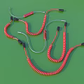 Multiple Red Coiled Cables Arrangement On Green Background With Black Connectors 3d model