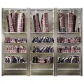 Butcher Shop Display Shelves With Hanging And Organized Various Fresh Meat Cuts