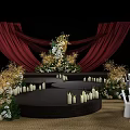 Elegant Banquet Hall with Red Curtains Stage Flower Arrangements Candles and White Chairs