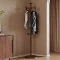 Wooden Coat Rack With Hanging Jackets And Sweater In Modern Room