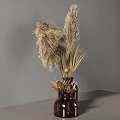 Brown Glass Vases With Dried Pampas Grass And Decorative Elements In Neutral Gray Interior