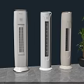 Modern Tower Air Cooler Fans With Three Units Against Deep Blue Wall And Green Plant