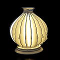 White Abstract Shaped Table Lamp With Unique Wavy Design And Soft Lighting For Home Decor