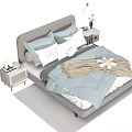 Modern Upholstered Double Bed With Gray Headboard Blue Bedding Pillows And Nightstand Lamp