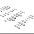 Multiple White Cylindrical Weapon Parts Arranged On Black Background