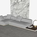 Light Gray Sectional Sofa With Soft Cushions Side Table Lamp And Marble Wall 3d model
