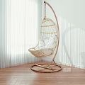 Modern Wicker Hanging Chair With White Cushions Metal Stand And Wooden Floor