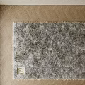 Soft Plush Square Rug On Herringbone Wooden Floor In Bright Room