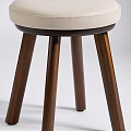 Modern Leisure Chair With Beige Padded Seat And Sturdy Wooden Legs Design