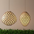 Decorative Hanging Lanterns With Woven Patterns Warm Light Against Light Wall Background Green Plants Below 3d model