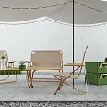 Outdoor Table Setup With Canopy String Lights Folding Chairs And Green Storage Boxes 3d model