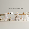 Elegant Luxury Wedding Dresses Display With Mannequins And Floral Decorations