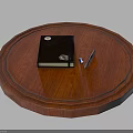 Round Red Wooden Table Top With Black Notebook Pen And USB Drive