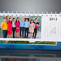 2015 Desk Calendar With Group Photo Of People And Green Landscape Design